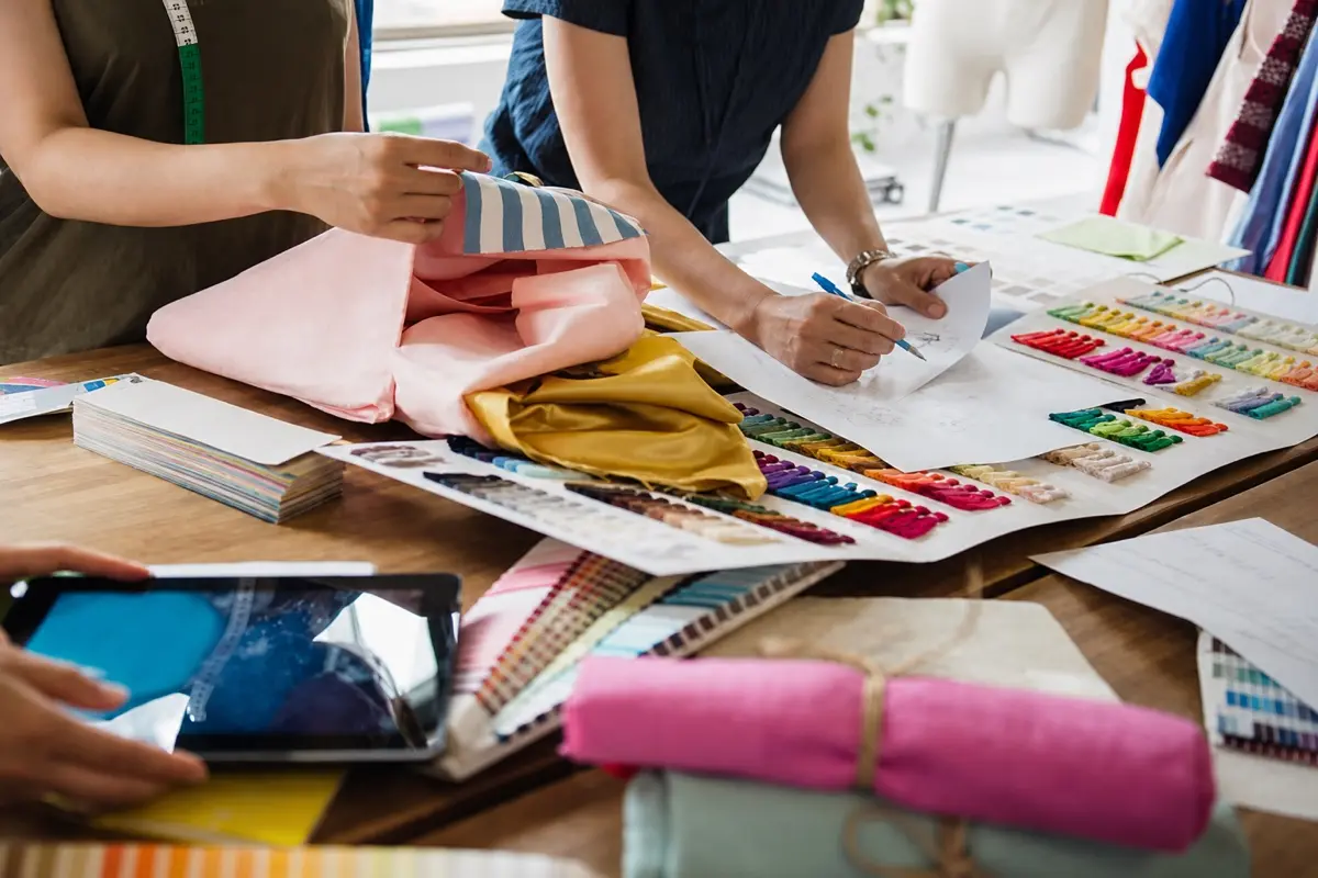 ElaraSilk team reviewing a custom silk product brief