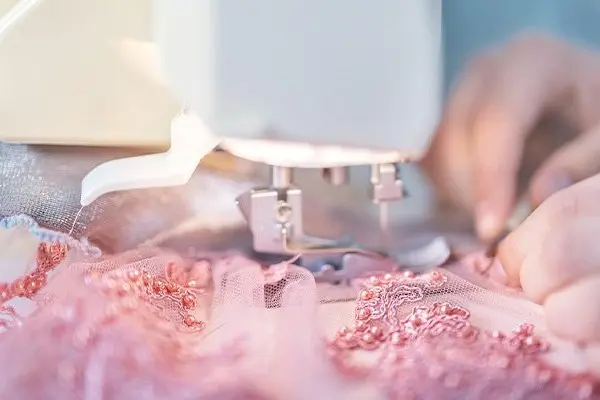 Hand rolling, cutting and sewing at ElaraSilk