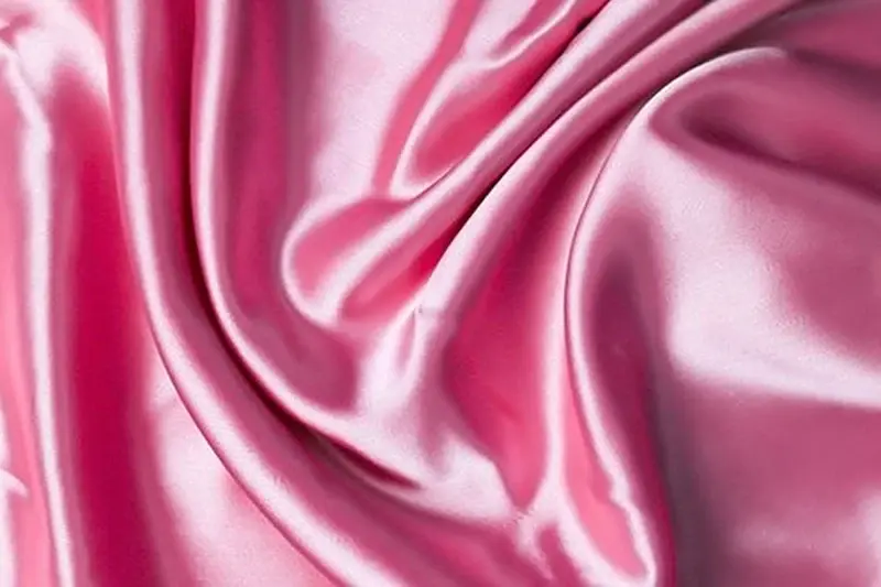 Close-up of pink silk satin surface