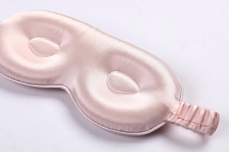 Contoured silk sleep mask shape