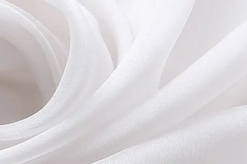White silk chiffon fabric showing its light and sheer construction