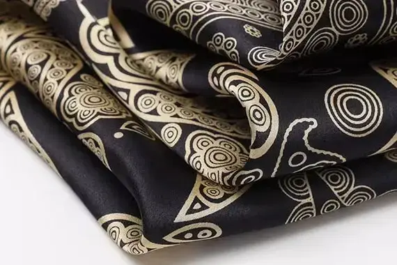 Scarf fabrics compared by surface body and drape