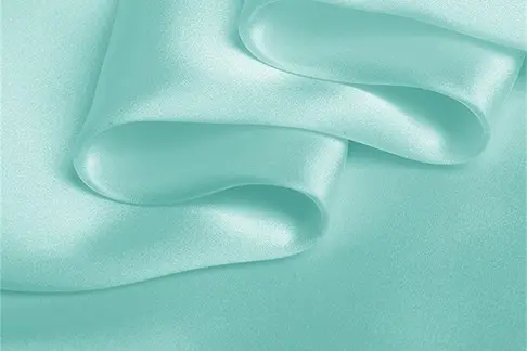 16 momme silk satin folded to show a lighter drape direction