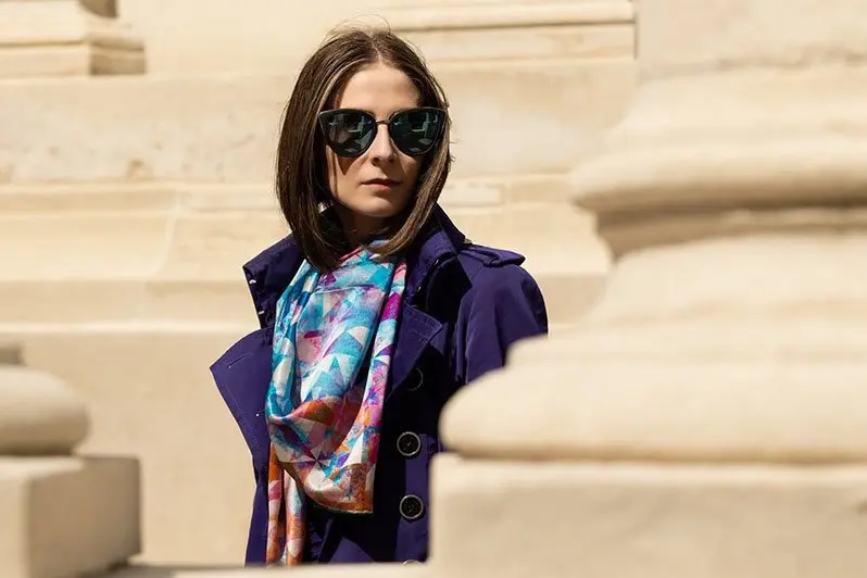Silk scarf styled with winter outerwear