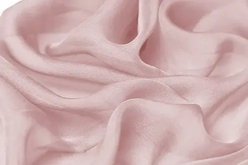 Pale pink silk chiffon arranged in soft folds to show its light drape