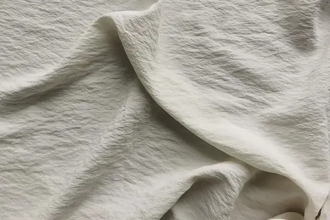 Light silk fabric laid loosely with no direct heat during drying