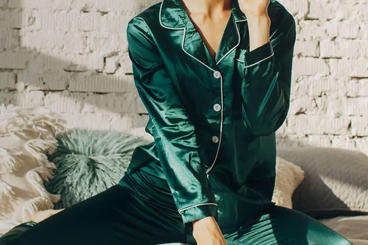 Green silk pajamas with contrast piping, buttons, collar and cuffs